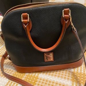 Used Black and Tan Dooney and Bourke purse! Still in very good condition